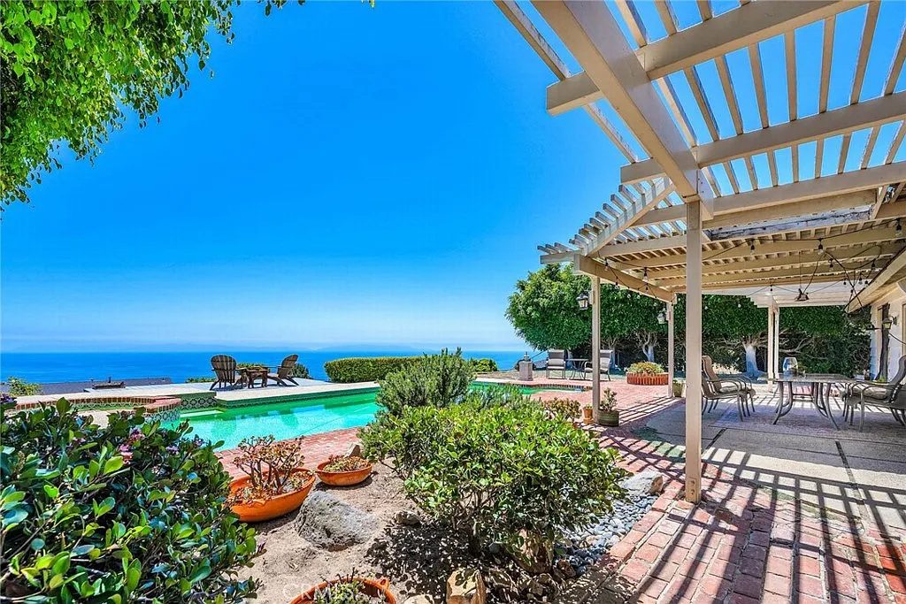 Private pool and pergola with ocean views at Eaglehaven, a single-level ALE-ready home in Rancho Palos Verdes