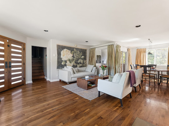 Open-plan living and dining room at Quail Drive, a furnished 4-bedroom home in Mount Washington, Los Angeles